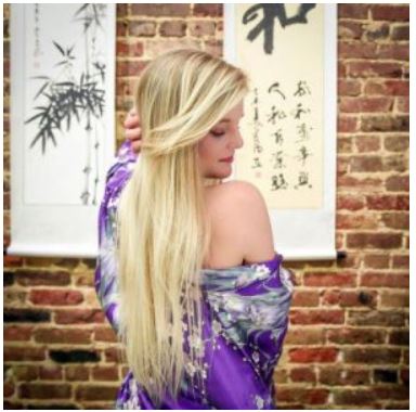 Beautiful woman wearing a kimono off the shoulder